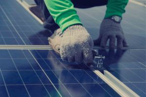 Solar panels being installed on a roof