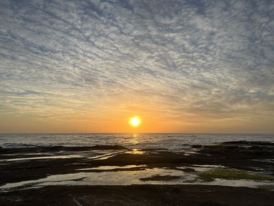 Photo of sunrise over the ocean