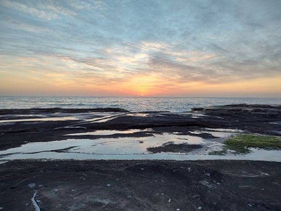 Outdoor sunrise photo over ocean