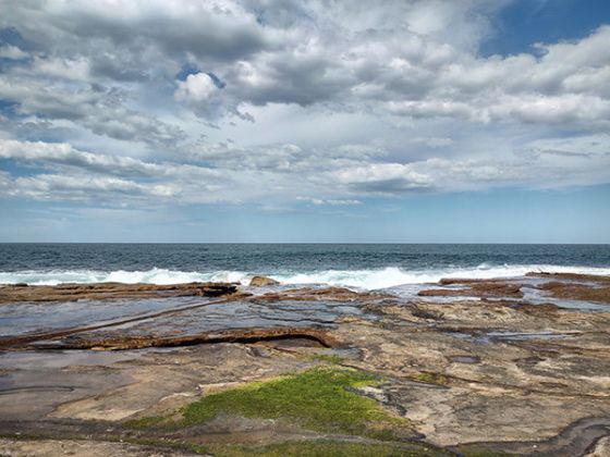 Outdoor photo of ocean and rocks