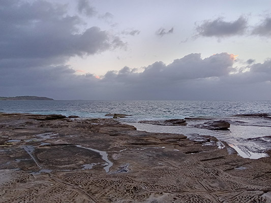 Outdoor photo of ocean and rock pools taken on TCL 20 R 5G phone