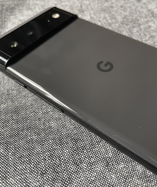 Closeup of back of Google Pixel 6 phone in grey