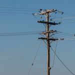 Electricity pole in blue sky background