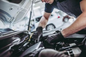 Mechanic working on car