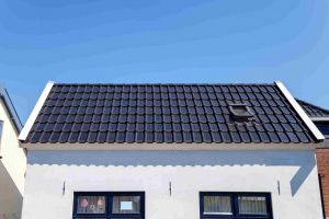 Solar tiles on the side of a roof 