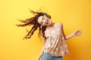 Woman listening to music with headphones