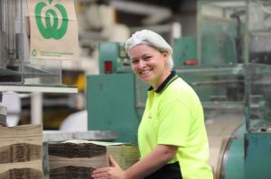 Woolworths worker making plastic bags