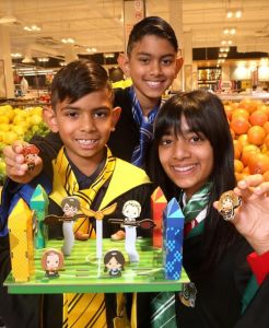 Coles kids playing with collectables