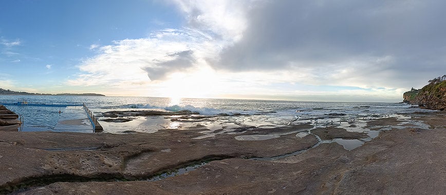 Panorama photo of ocean and rock pools