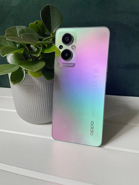 Back of OPPO Reno8 Lite 5G phone in rainbow colour 