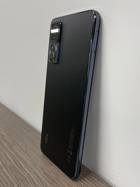 Side of TCL 30+ phone in black