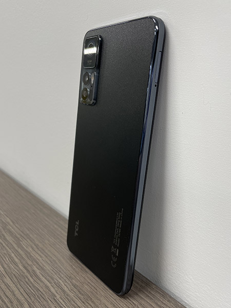 Side of TCL 30+ phone in black