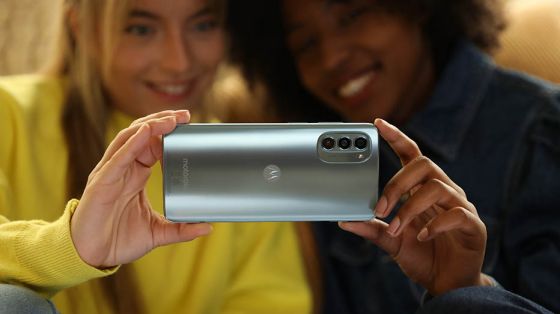 Two women taking a selfie with the Moto G62 5G 