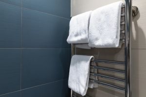 heated towel rail with towels 