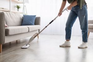 man with steam mop