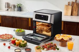 air fryer oven with roast chicken inside