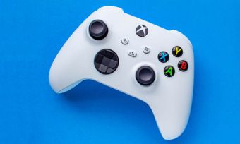 White Xbox controller on blue background