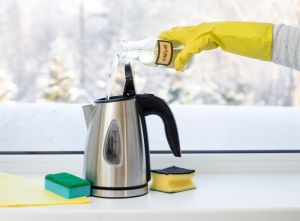 Clean limescale from kettle with vinegar