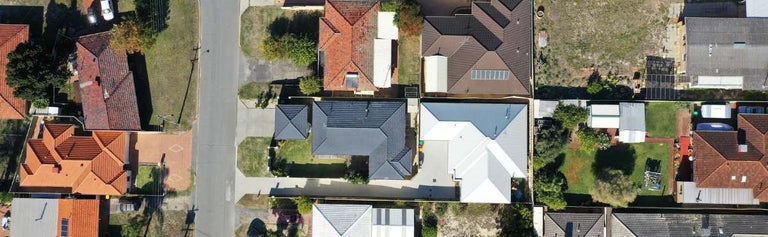 Aerial view of houses in a residential neighbourhood.