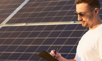 man with solar panels