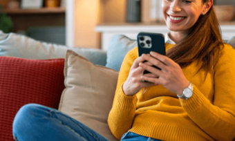 Woman using phone app. AGL Energy app for phone