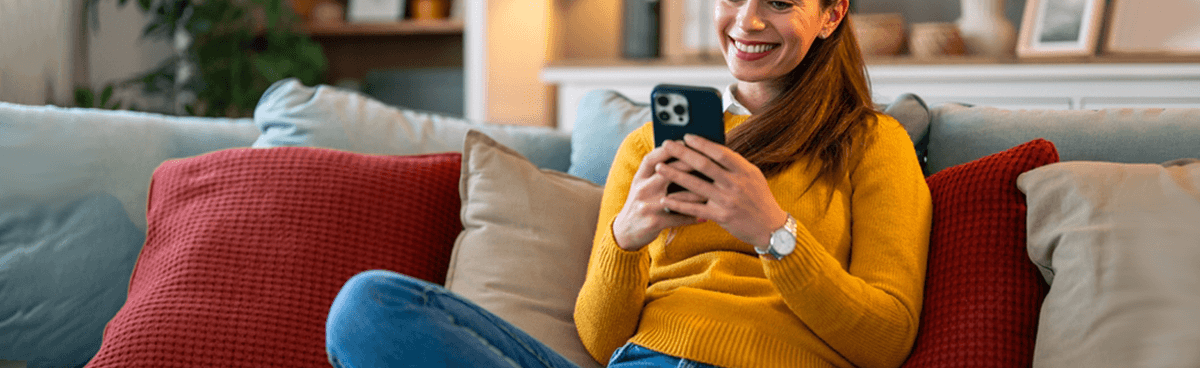 Woman using phone app. AGL Energy app for phone