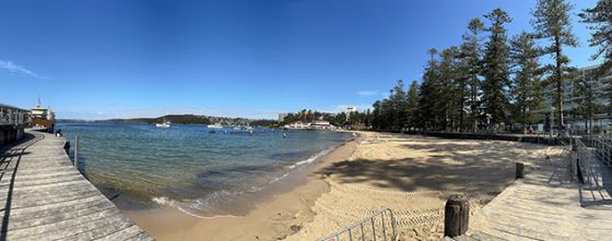 Panorama photo of beach and wharf