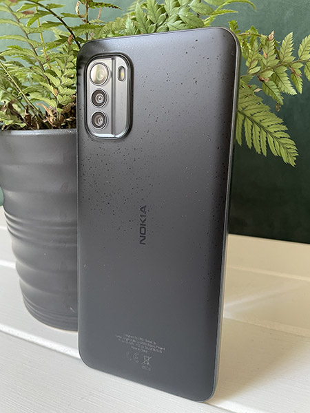 Back of Nokia G60 5G phone with pot plant