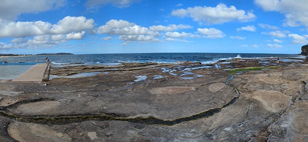 Panorama photo of ocean and rock pools