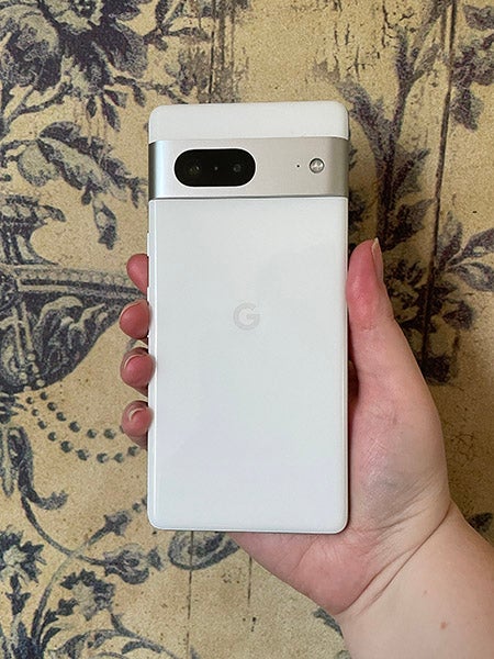 Back of Pixel 7 phone in white being held