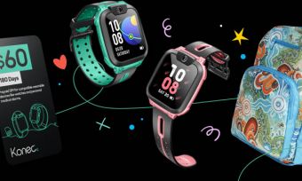 Backpack, kids' watches and a SIM card on a black background