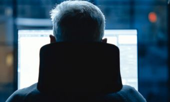 Man looking at computer screen