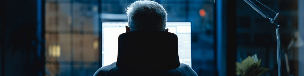 Man looking at computer screen