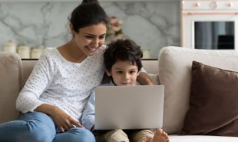 Woman with son looking at computer