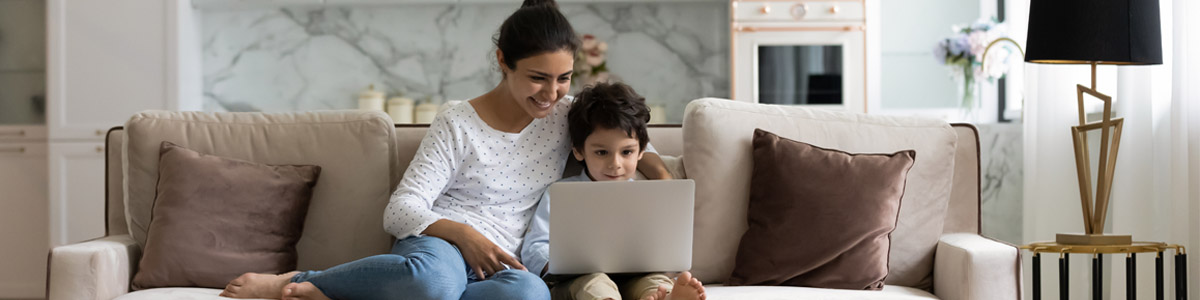 Woman with son looking at computer