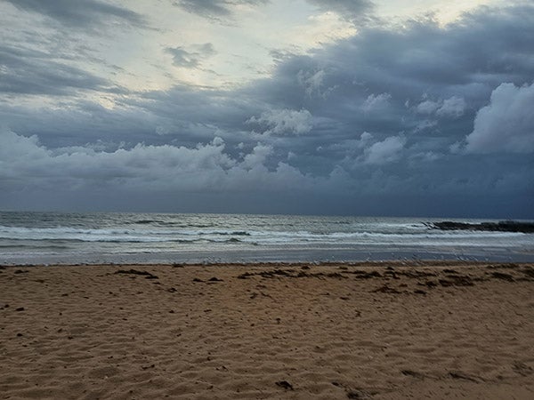 Photo of beach with clouds