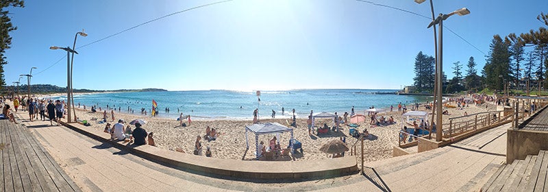 Panorama photo of sunny beach