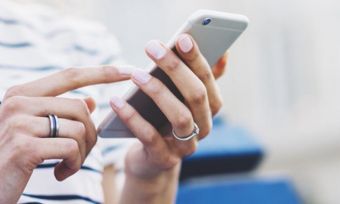 Closeup of woman using phone