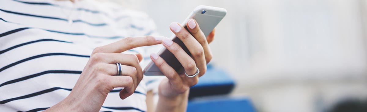 Closeup of woman using phone