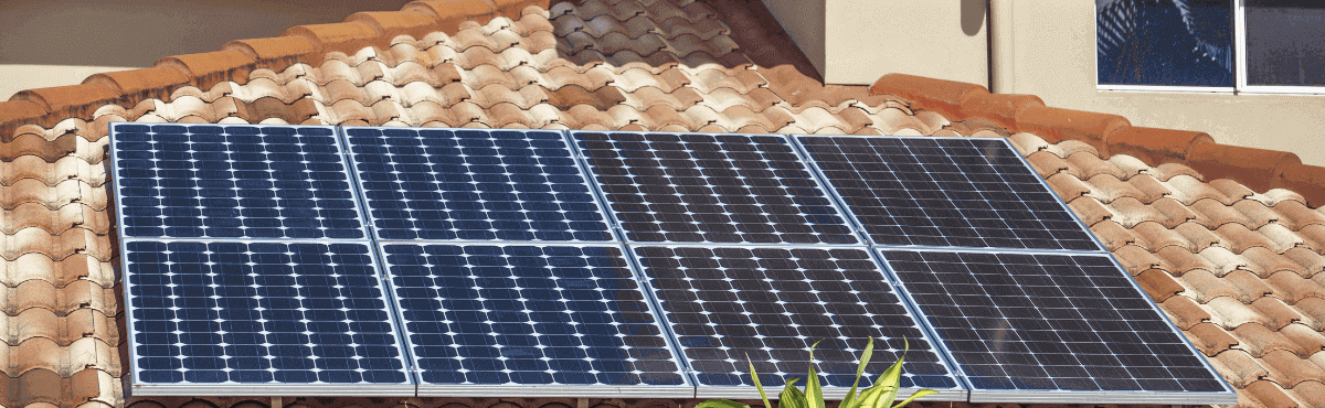 Close up of solar panels on a rooftop.