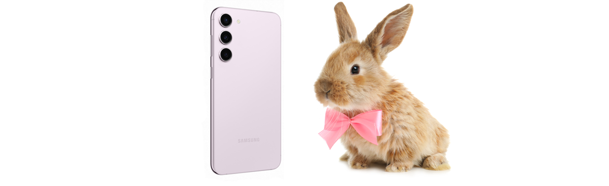 Samsung Galaxy S23 in purple next to small bunny with a pink neckerchief