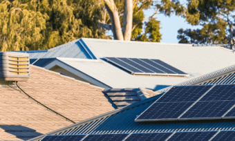 Rooftop solar panels on houses in Australia.