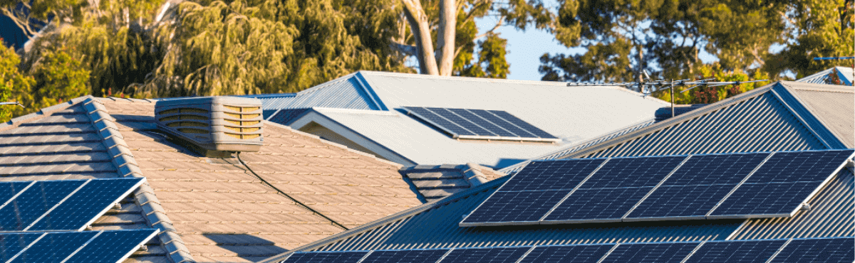 Rooftop solar panels on houses in Australia.