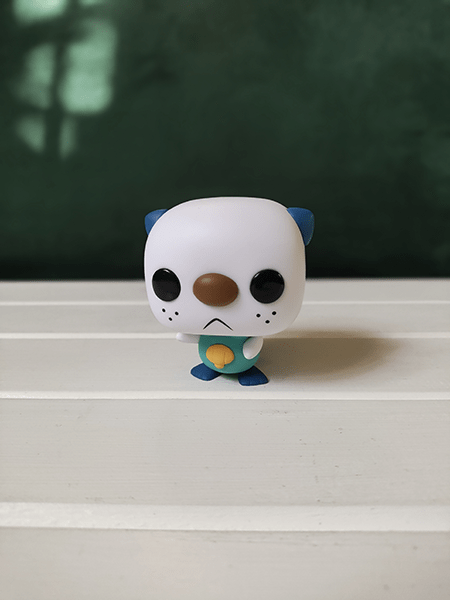 Portrait photo of Oshawott figurine 