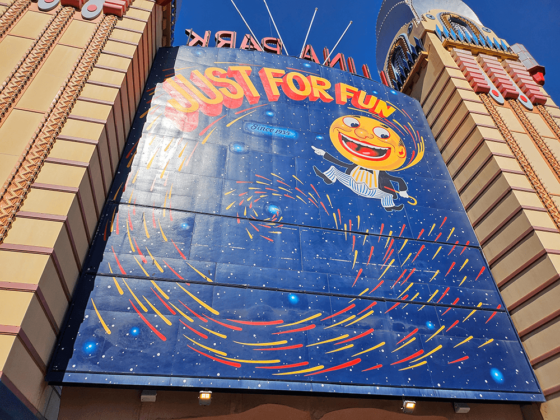 Sign for Luna Park's Rotor ride with cartoon moon