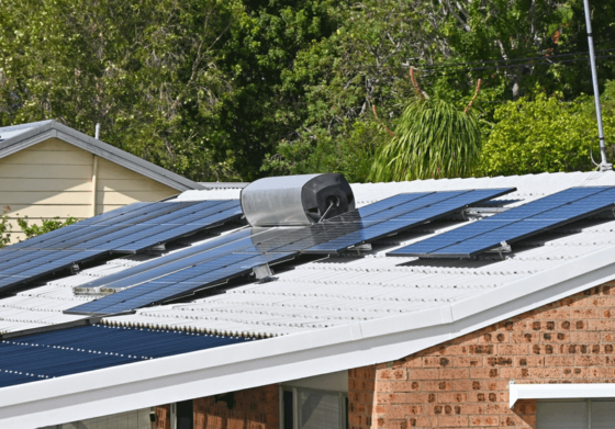 Solar hot water heater and solar panels on roof