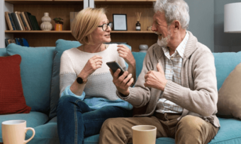 Senior couple using phone. AGL Seniors plan
