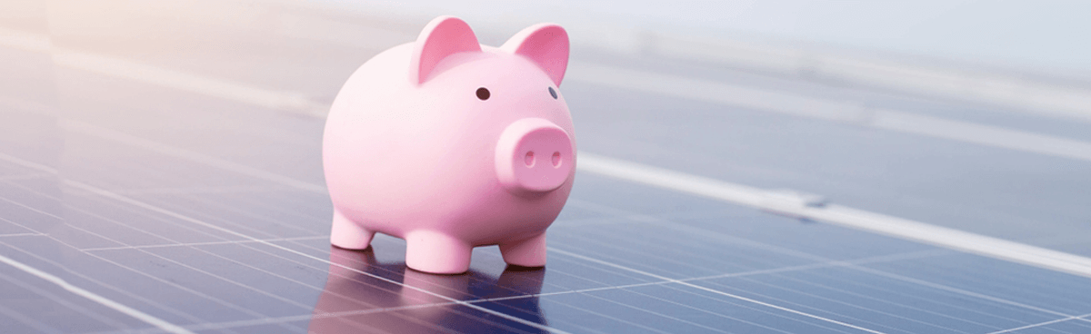 Solar panel rebates in Australia. Piggy bank on solar panels.