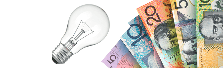 Australian bank notes next to a light bulb