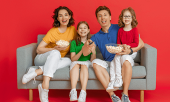 Happy family watching TV